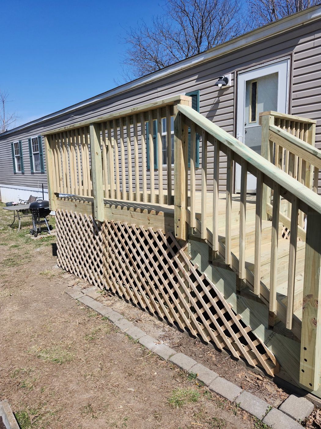 Deck with lattice skirting in Belton, MO